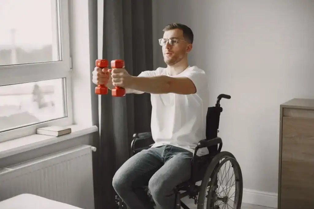 Image of man doing exercise in his wheelchair to aid weight loss Suffolk