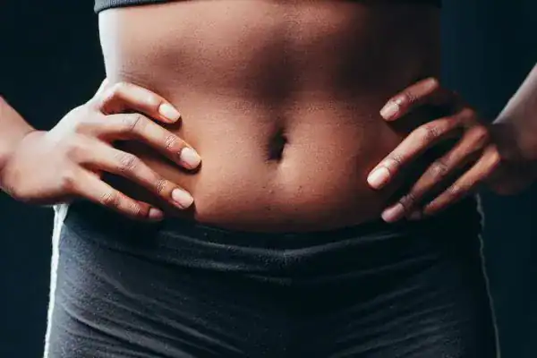 Toning Your Stomach: The Ultimate Guide to Achieving a Sculpted Stomach While Shedding Pounds 1 Image of a toned stomach after non surgical treatment Suffolk